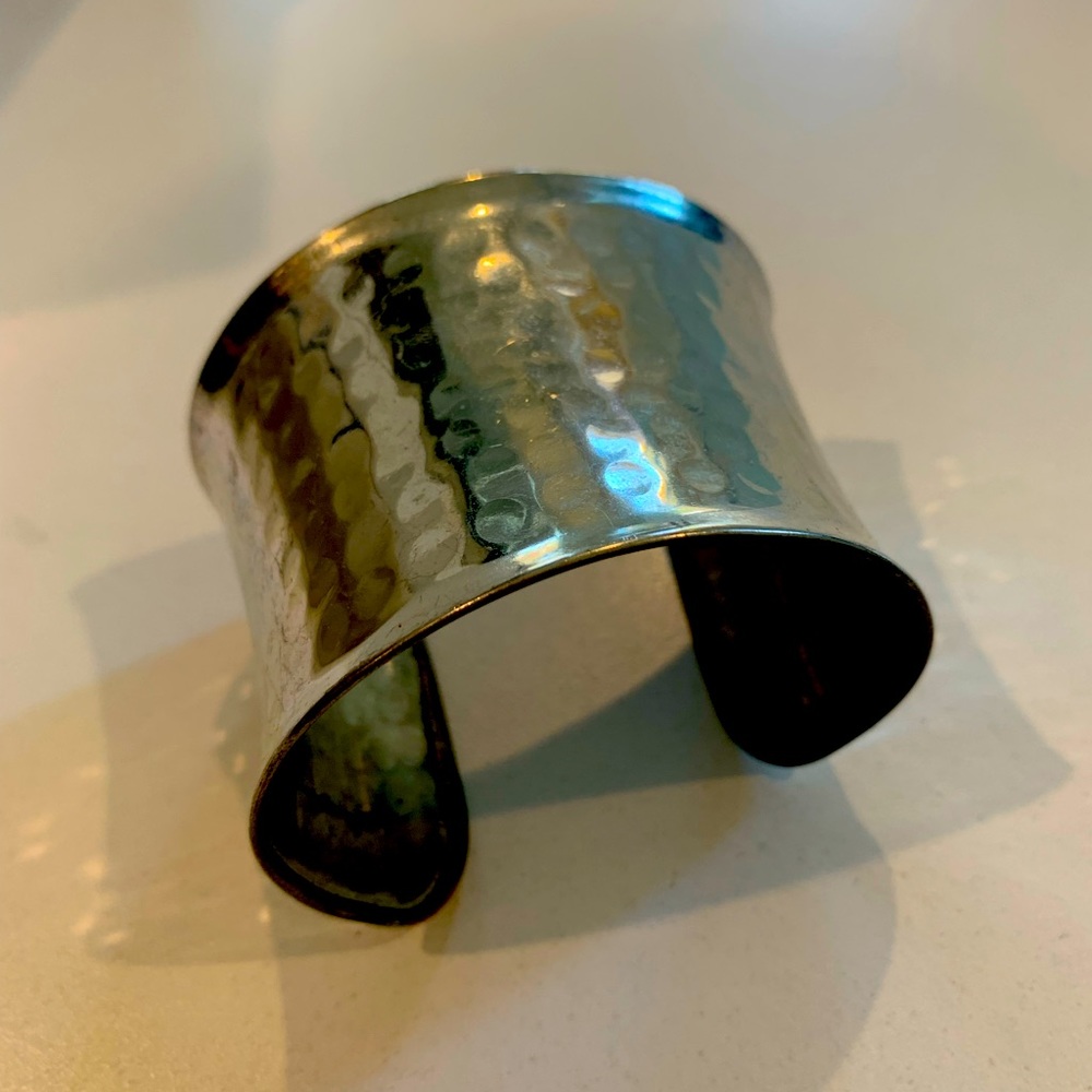 Galvanized silver cuff bracelet.